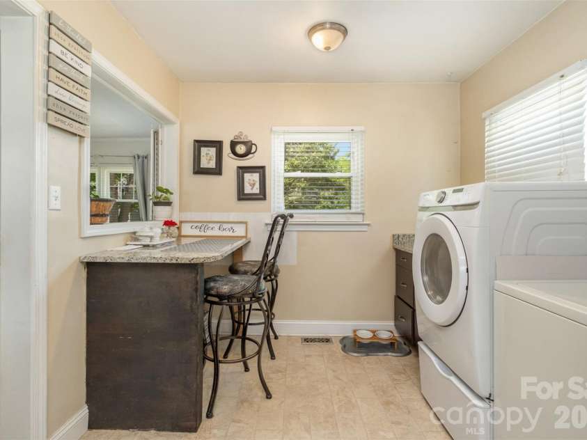 145 Driftwood Drive, Mooresville, NC 28117.  MLS# CAR4253842, YatesRealty ID 10771. Breakfast area & Laundry