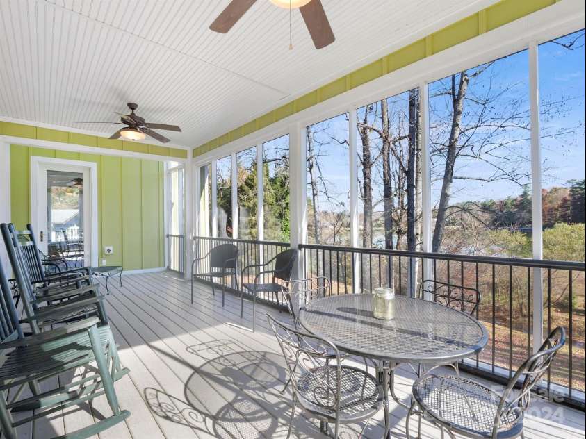 78 Assembly Drive, Flat Rock, NC 28731.  MLS# CAR4084810, YatesRealty ID 10772. Main level screened porch.