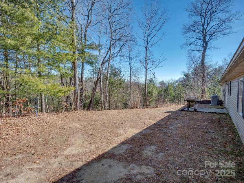 1077 Summit Springs Drive, Flat Rock, NC 28731.  MLS# CAR4218532, YatesRealty ID 10776. 