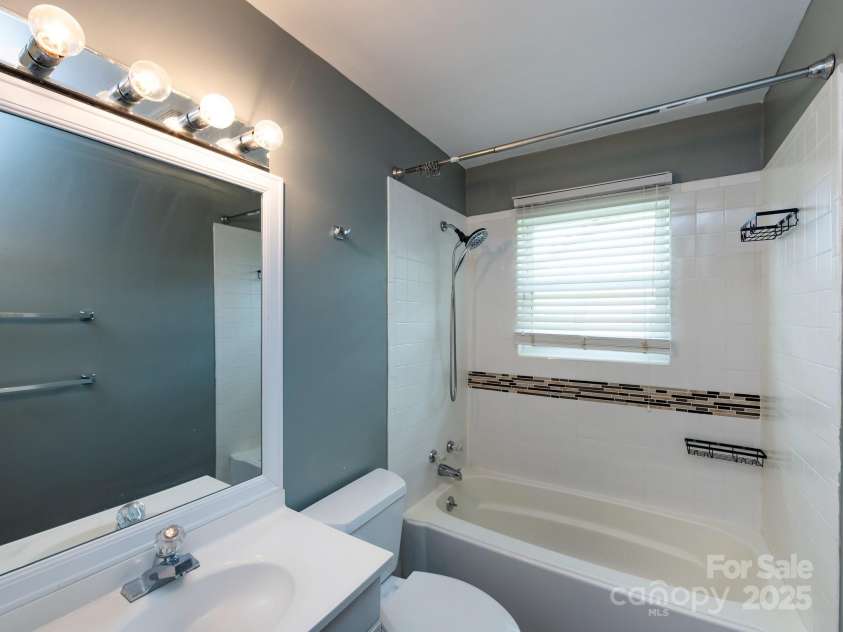 7109 Bisaner Street, Charlotte, NC 28269.  MLS# CAR4302995, YatesRealty ID 10789. Guest Bathroom