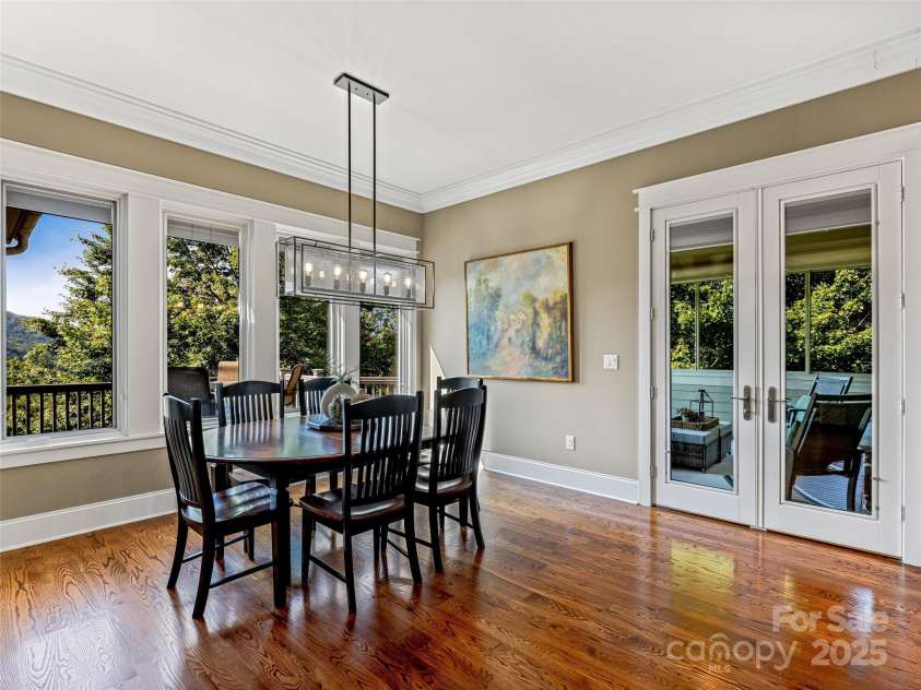 6 Yellow Wood Lane, Horse Shoe, NC 28742.  MLS# CAR4180879, YatesRealty ID 1079. Easy access to the All Seasons room from the Dining Room