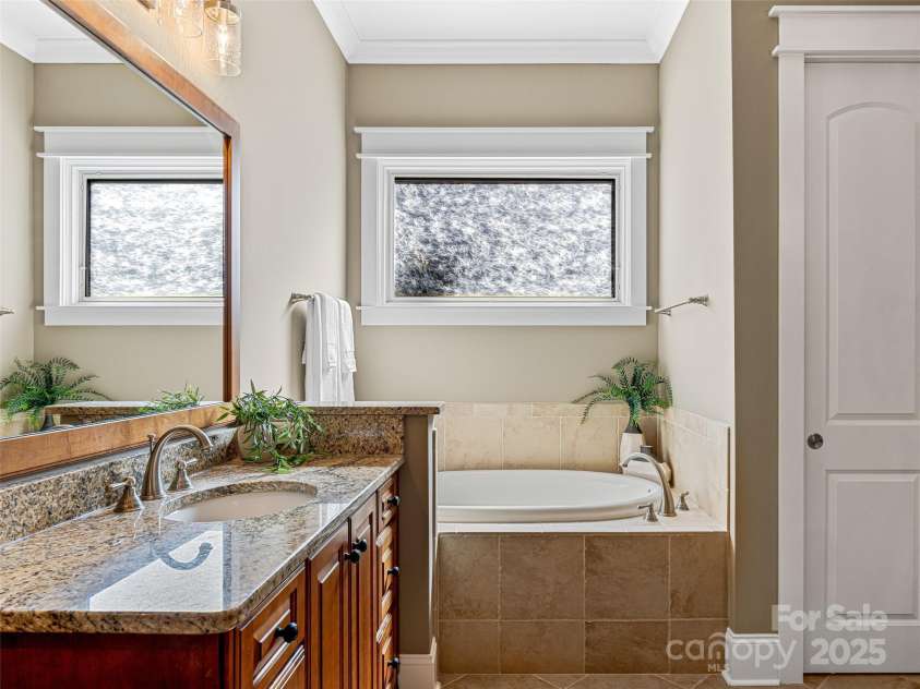 6 Yellow Wood Lane, Horse Shoe, NC 28742.  MLS# CAR4180879, YatesRealty ID 1079. Luxury Spa Like Primary Bath