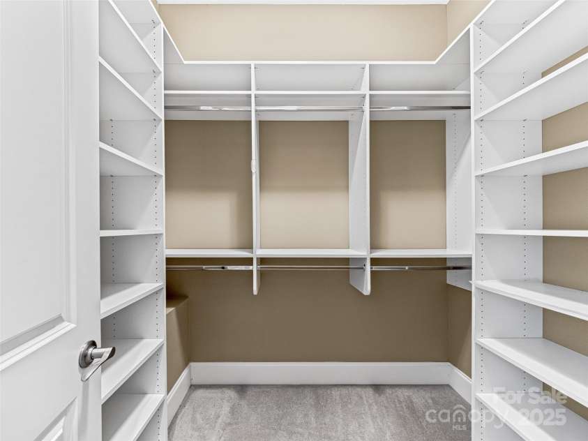 6 Yellow Wood Lane, Horse Shoe, NC 28742.  MLS# CAR4180879, YatesRealty ID 1079. One of the two walk in closets!