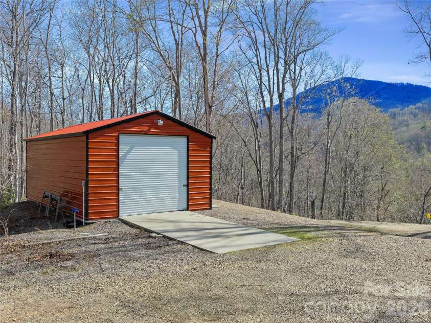 3502 Bolens Creek Road, Burnsville, NC 28714.  MLS# CAR4361834, YatesRealty ID 10791. Tractor Shed/ Workshop