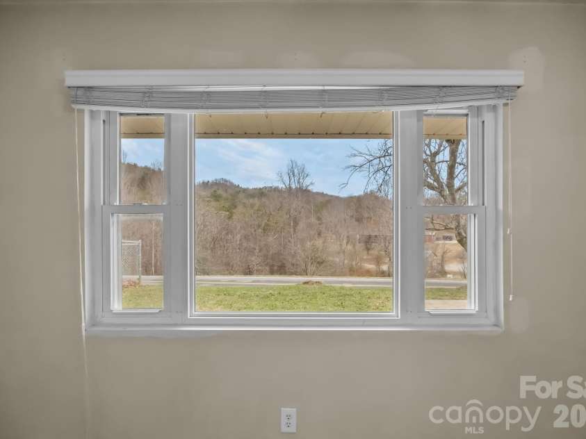 82 Greasy Cove Road, Leicester, NC 28748.  MLS# CAR4330062, YatesRealty ID 10795. 