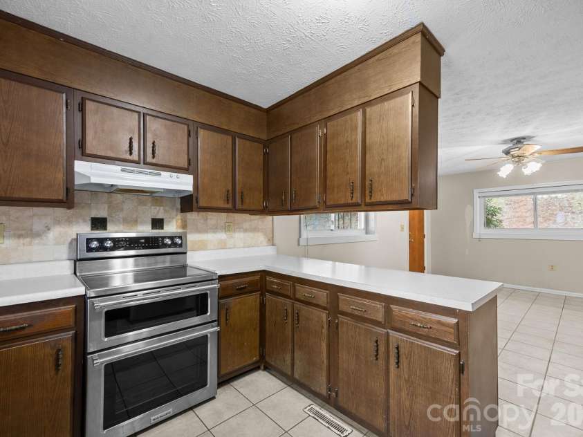 82 Greasy Cove Road, Leicester, NC 28748.  MLS# CAR4330062, YatesRealty ID 10795. 