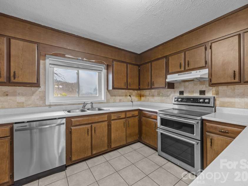 82 Greasy Cove Road, Leicester, NC 28748.  MLS# CAR4330062, YatesRealty ID 10795. All appliances updated