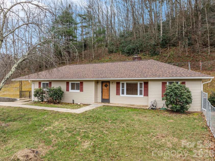 82 Greasy Cove Road, Leicester, NC 28748.  MLS# CAR4330062, YatesRealty ID 10795. Front of house