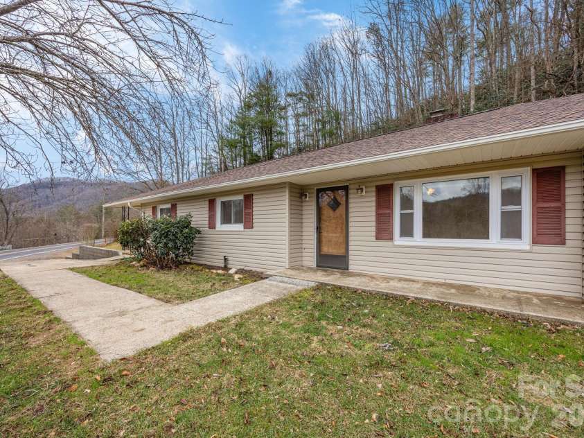 82 Greasy Cove Road, Leicester, NC 28748.  MLS# CAR4330062, YatesRealty ID 10795. Front of house