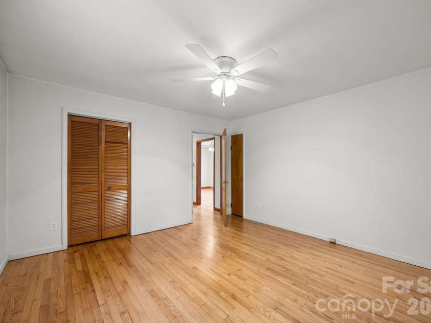 82 Greasy Cove Road, Leicester, NC 28748.  MLS# CAR4330062, YatesRealty ID 10795. Primary Bedroom