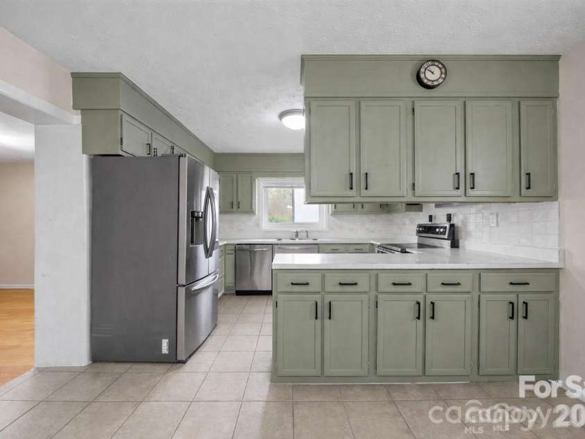 82 Greasy Cove Road, Leicester, NC 28748.  MLS# CAR4330062, YatesRealty ID 10795. Virtually Painted Cabinets and updated hardware
