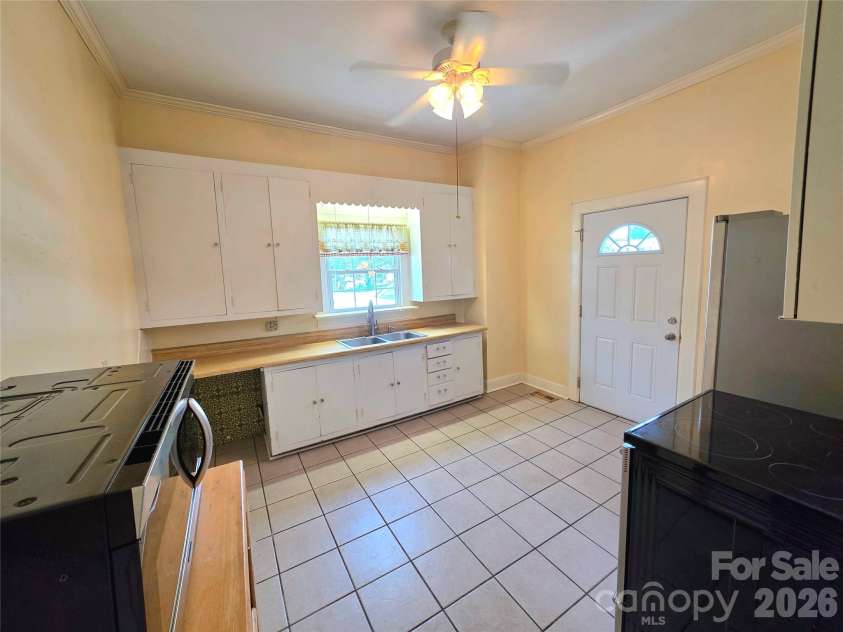 1244 21st Street, Hickory, NC 28601.  MLS# CAR4338743, YatesRealty ID 10800. Lovely lighy from window over kitchen sink.