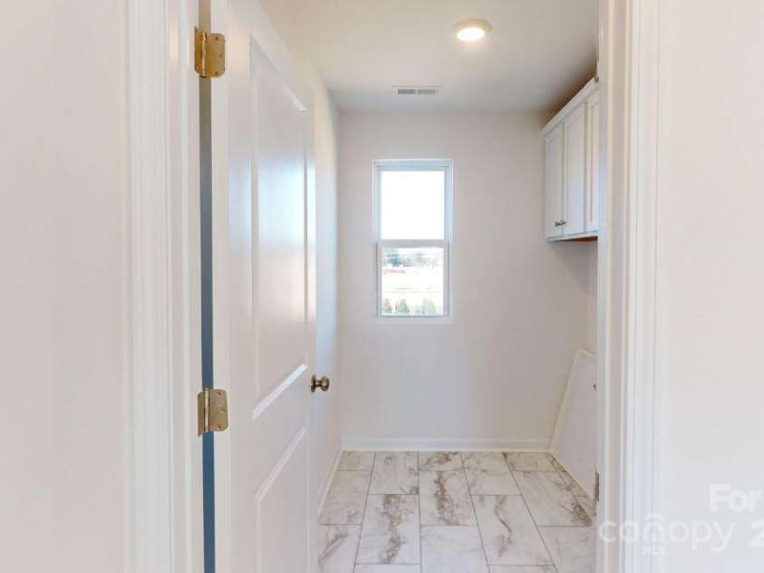 1809 Augustine Street, Monroe, NC 28112.  MLS# CAR4182179, YatesRealty ID 10815. Laundry room