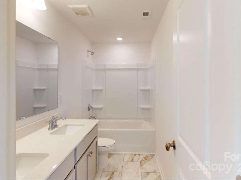 1809 Augustine Street, Monroe, NC 28112.  MLS# CAR4182179, YatesRealty ID 10815. Secondary bathroom