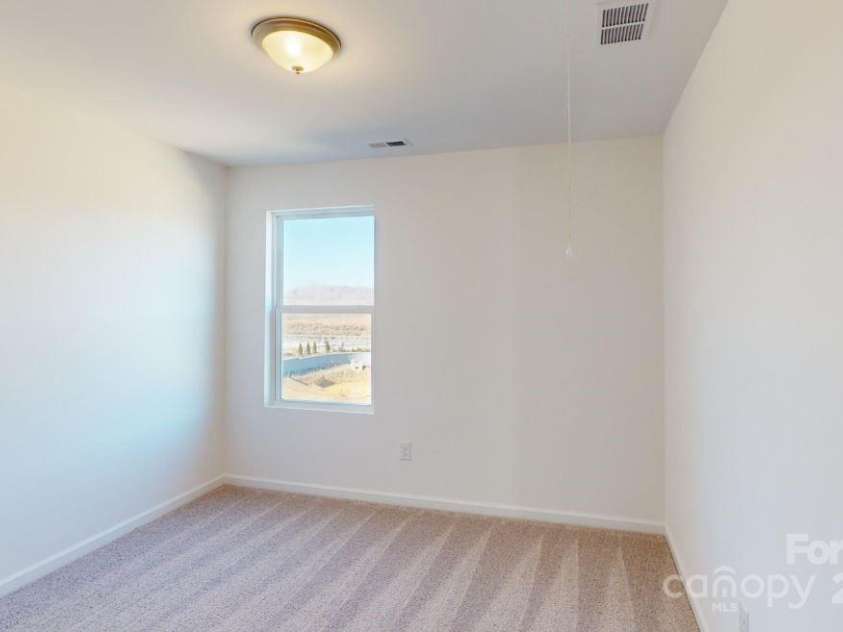 1809 Augustine Street, Monroe, NC 28112.  MLS# CAR4182179, YatesRealty ID 10815. Secondary bedroom