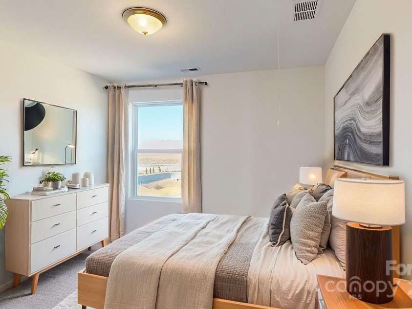 1809 Augustine Street, Monroe, NC 28112.  MLS# CAR4182179, YatesRealty ID 10815. Secondary bedroom shown with virtual staging