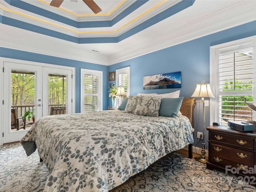 1201 Sunset Lane, Anderson, SC 29626.  MLS# CAR4224408, YatesRealty ID 1082. Primary suite with lake views