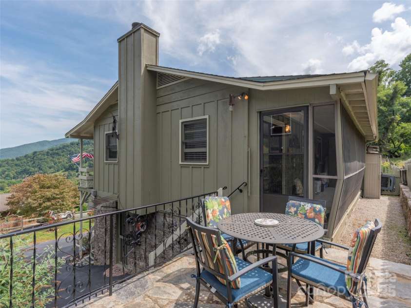 21 Flint Lane, Maggie Valley, NC 28751.  MLS# CAR4181508, YatesRealty ID 10824. Main Level Stone Patio with Mountain Views