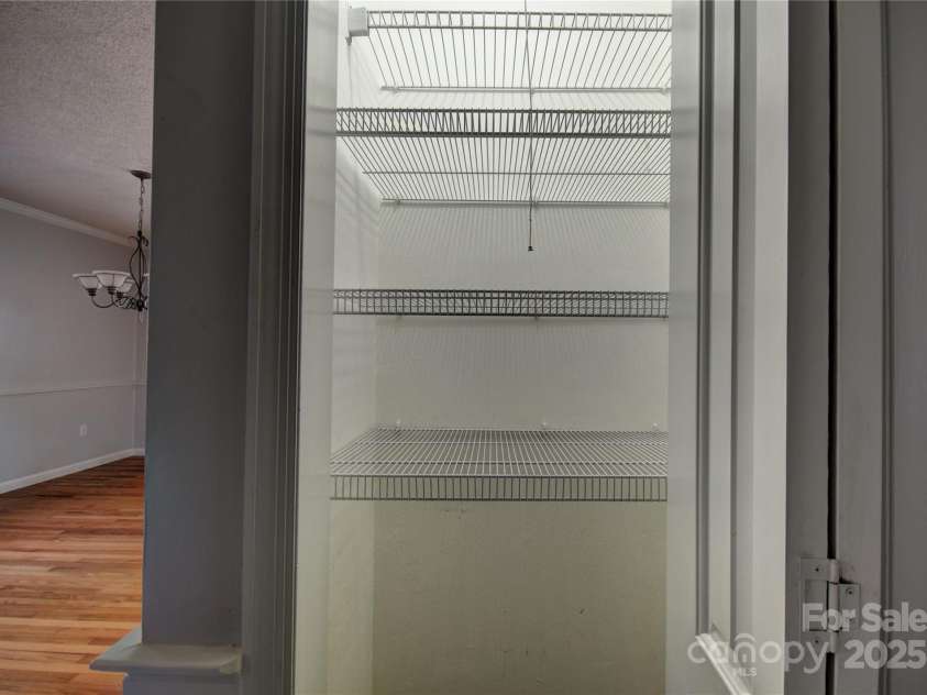 857 Country Club Drive, Maggie Valley, NC 28751.  MLS# CAR4240227, YatesRealty ID 10826. Pantry just off the kitchen
