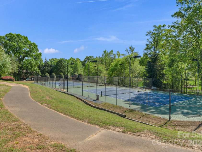 8100 Skye Knoll Drive, Waxhaw, NC 28173.  MLS# CAR4244698, YatesRealty ID 10827. Tennis Courts at Clubhouse