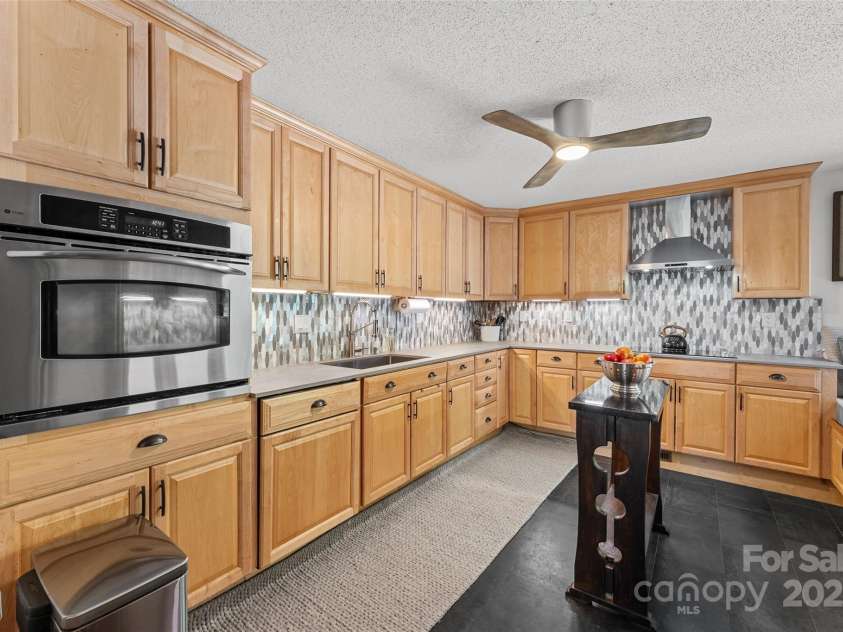 207 Kingfisher Road, Brevard, NC 28712.  MLS# CAR4253015, YatesRealty ID 10831. 