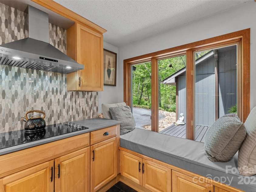 207 Kingfisher Road, Brevard, NC 28712.  MLS# CAR4253015, YatesRealty ID 10831. 