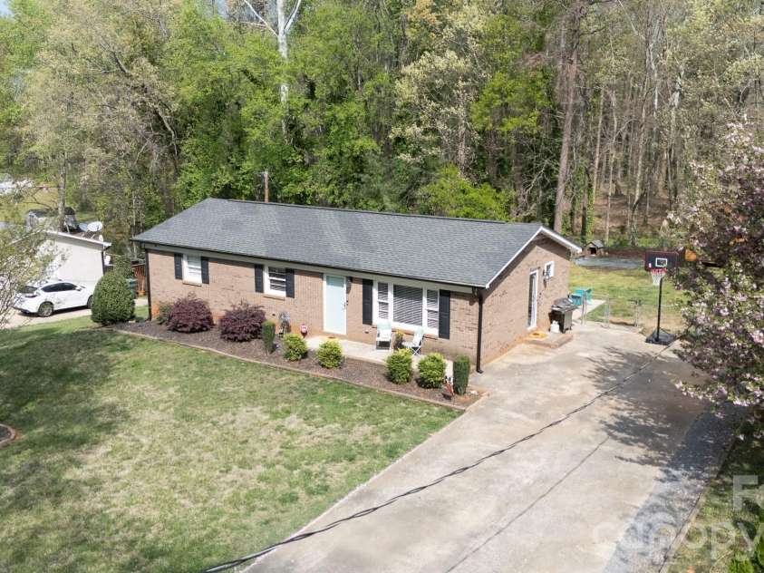 2640 Meadow Lark Lane, Gastonia, NC 28056.  MLS# CAR4364161, YatesRealty ID 10832. Tree lined