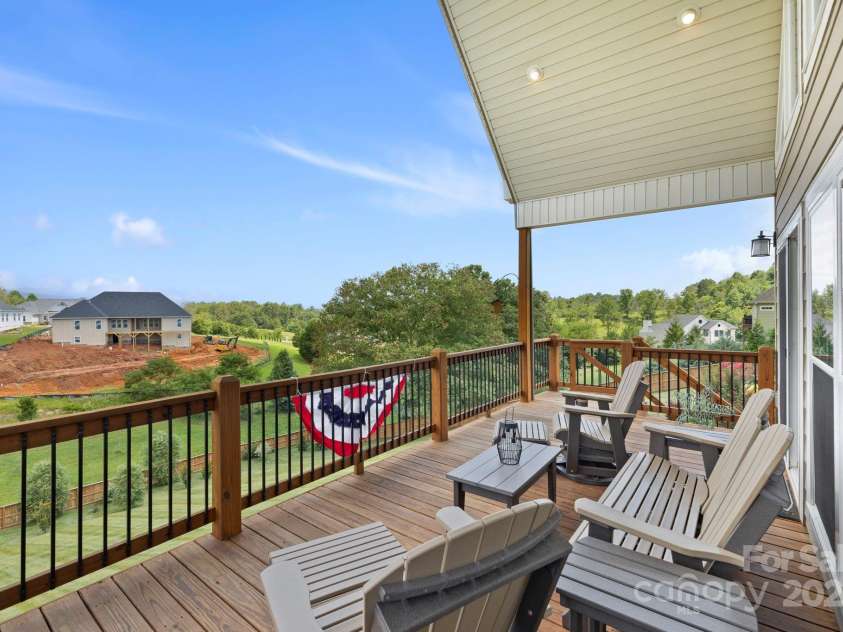 16 Enchanted Oak Lane, Alexander, NC 28701.  MLS# CAR4285091, YatesRealty ID 10833. Gorgeous views from the deck