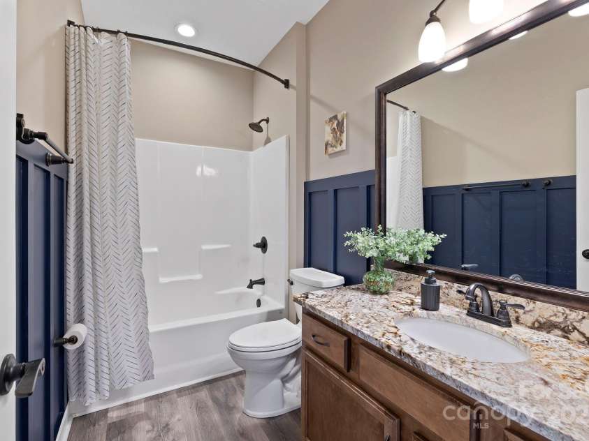 16 Enchanted Oak Lane, Alexander, NC 28701.  MLS# CAR4285091, YatesRealty ID 10833. Guest bath w/granite & custom feautres