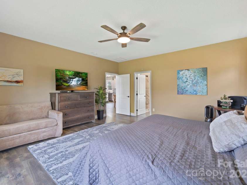 16 Enchanted Oak Lane, Alexander, NC 28701.  MLS# CAR4285091, YatesRealty ID 10833. Primary bedroom
