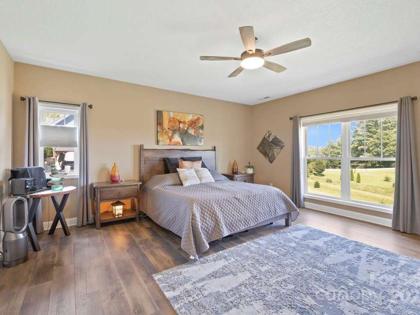 16 Enchanted Oak Lane, Alexander, NC 28701.  MLS# CAR4285091, YatesRealty ID 10833. Primary bedroom w/ensuite