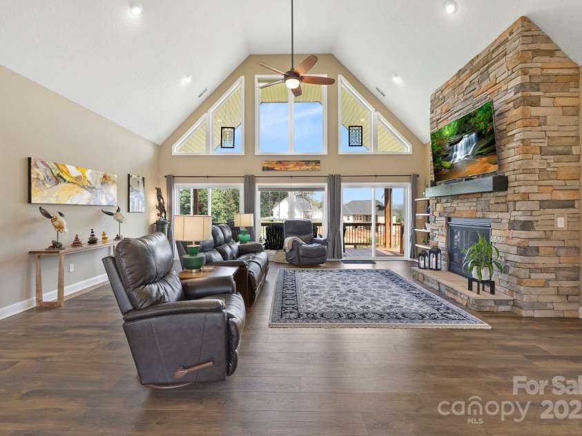 16 Enchanted Oak Lane, Alexander, NC 28701.  MLS# CAR4285091, YatesRealty ID 10833. Vaulted Ceilings w/rock fireplace