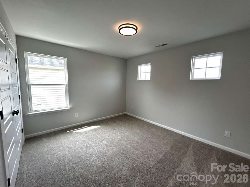 4607 Tulle Drive, Indian Trail, NC 28079.  MLS# CAR4297261, YatesRealty ID 10836. Bedroom 3