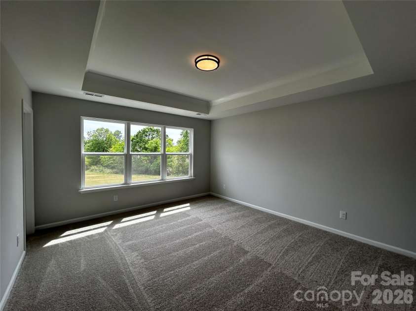 4607 Tulle Drive, Indian Trail, NC 28079.  MLS# CAR4297261, YatesRealty ID 10836. Premier Bedroom