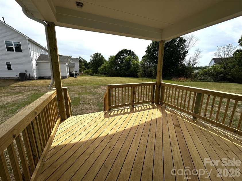 4607 Tulle Drive, Indian Trail, NC 28079.  MLS# CAR4297261, YatesRealty ID 10836. Rear Covered Deck
