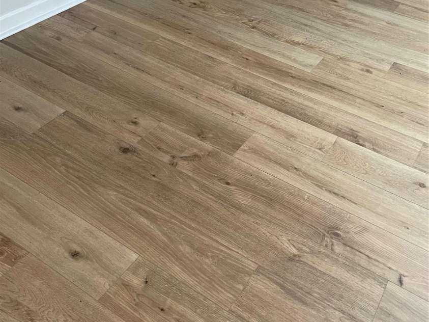 7201 Winery Lane, Charlotte, NC 28227.  MLS# CAR4174403, YatesRealty ID 1084. All new luxury plank flooring throughout