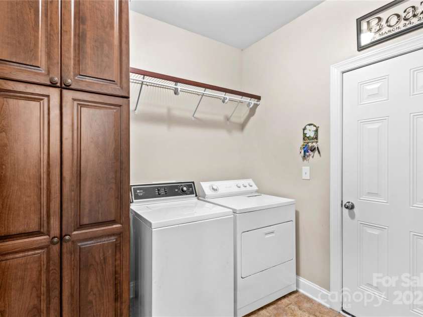 7896 Harbor Master Court, Denver, NC 28037.  MLS# CAR4251576, YatesRealty ID 10840. Enter the laundry room coming from the garage making it a great drop zone area.