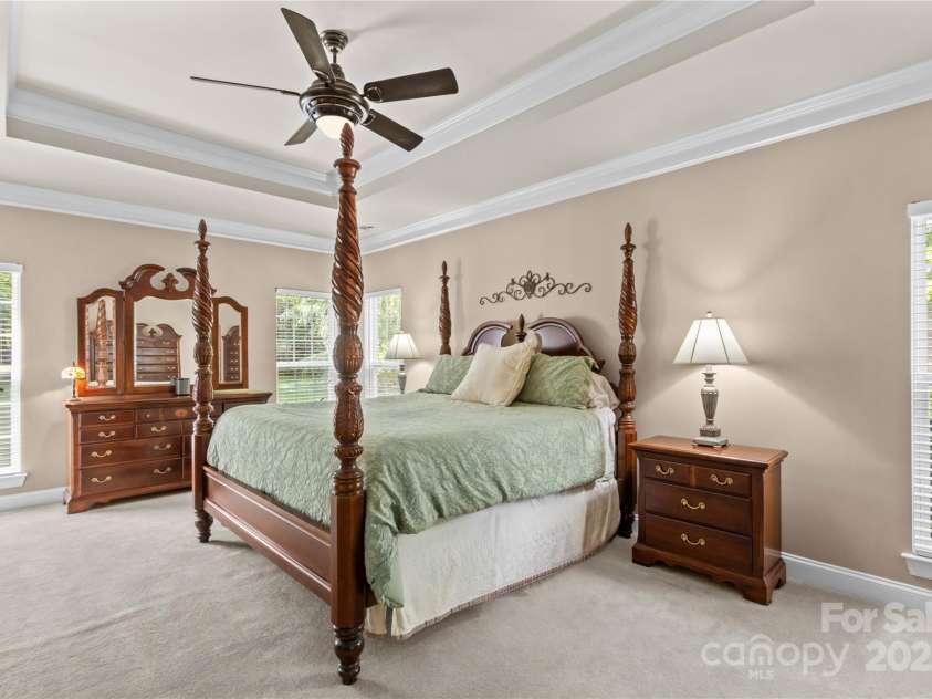 7896 Harbor Master Court, Denver, NC 28037.  MLS# CAR4251576, YatesRealty ID 10840. Main level primary bedroom is spacious with plenty of room for all your furniture.