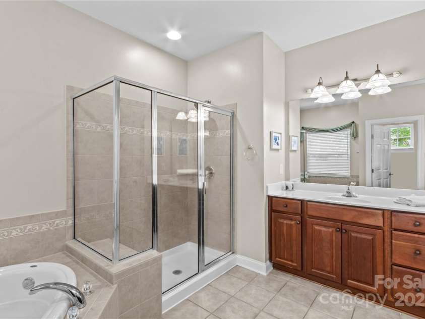 7896 Harbor Master Court, Denver, NC 28037.  MLS# CAR4251576, YatesRealty ID 10840. Walk-in shower with sink.