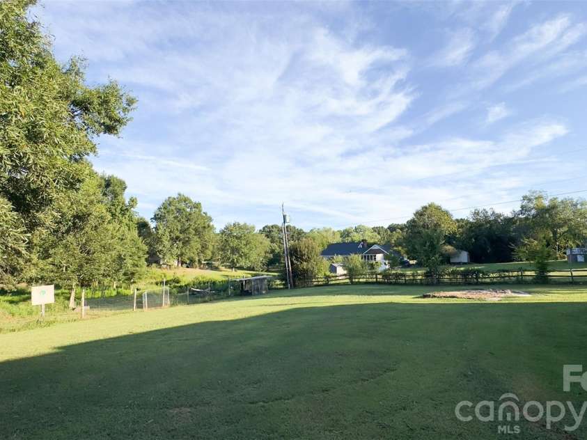 3014 Morgan Mill Road, Monroe, NC 28110.  MLS# CAR4368018, YatesRealty ID 10841. Backyard