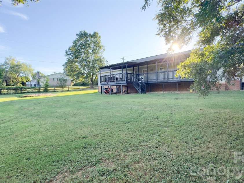 3014 Morgan Mill Road, Monroe, NC 28110.  MLS# CAR4368018, YatesRealty ID 10841. Backyard and Deck