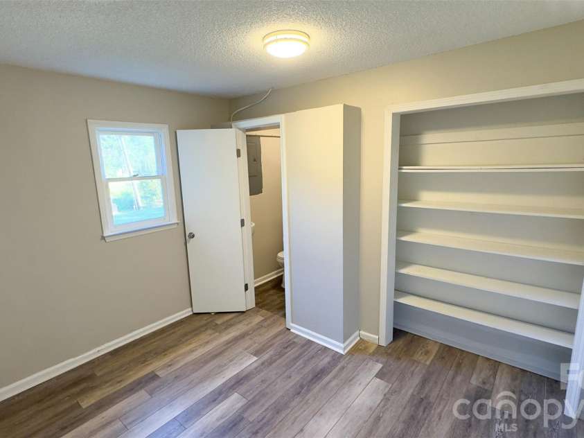 3014 Morgan Mill Road, Monroe, NC 28110.  MLS# CAR4368018, YatesRealty ID 10841. Bedroom with Full Bathroom