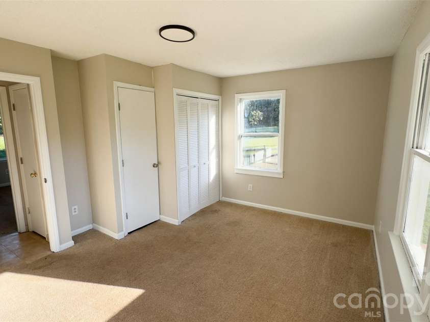 3014 Morgan Mill Road, Monroe, NC 28110.  MLS# CAR4368018, YatesRealty ID 10841. Bedroom with Full Bathroom and closet