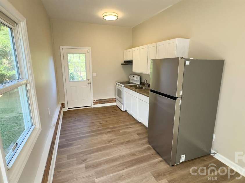 3014 Morgan Mill Road, Monroe, NC 28110.  MLS# CAR4368018, YatesRealty ID 10841. In-Law Suite Kitchen