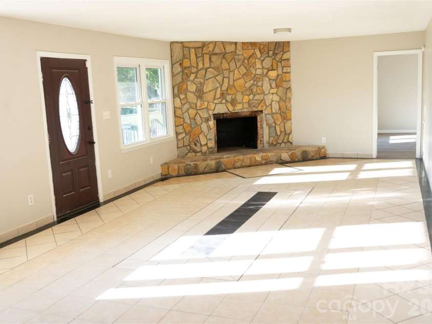 3014 Morgan Mill Road, Monroe, NC 28110.  MLS# CAR4368018, YatesRealty ID 10841. Living Room