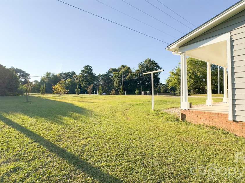 3014 Morgan Mill Road, Monroe, NC 28110.  MLS# CAR4368018, YatesRealty ID 10841. View of front road