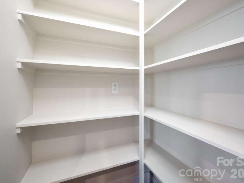 207 Ferrell Lane, Black Mountain, NC 28711.  MLS# CAR4344334, YatesRealty ID 10847. Custom Shelving in Pantry