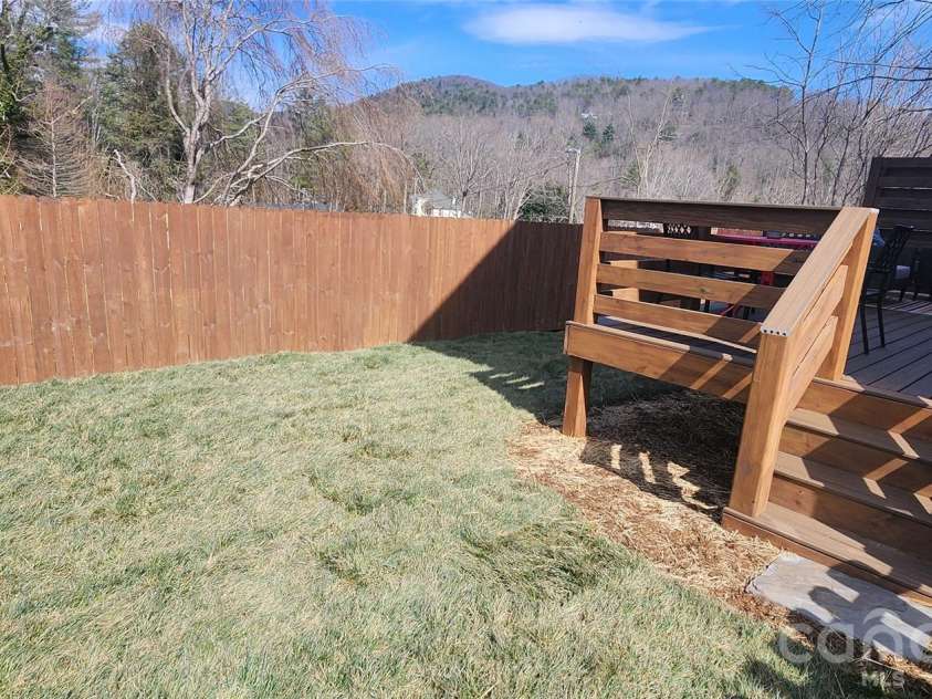 207 Ferrell Lane, Black Mountain, NC 28711.  MLS# CAR4344334, YatesRealty ID 10847. Fully fenced back yard.