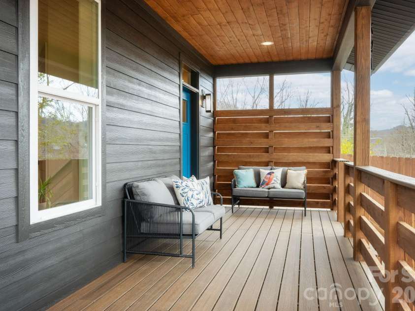 207 Ferrell Lane, Black Mountain, NC 28711.  MLS# CAR4344334, YatesRealty ID 10847. Trex Decking on Covered Front Porch