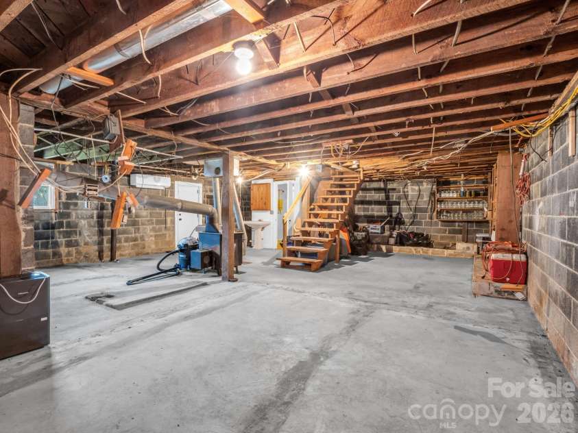 1086 Carters Ridge Road, Spruce Pine, NC 28777.  MLS# CAR4351879, YatesRealty ID 10853. Basement